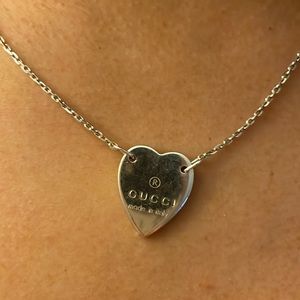 Authentic Gucci trademark pendant heart necklace in sterling silver.